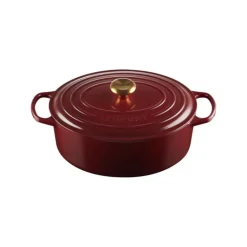 Cocotte en Fonte Ovale 31 cm Garnet Bouton Doré Le Creuset Signature
