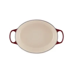 Cocotte en Fonte Ovale 31 cm Garnet Bouton Doré Le Creuset Signature
