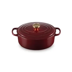 Cocotte en Fonte Ovale 29 cm Garnet Bouton Doré Le Creuset Signature