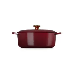 Cocotte en Fonte Ovale 29 cm Garnet Bouton Doré Le Creuset Signature