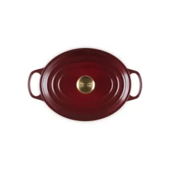 Cocotte en Fonte Ovale 29 cm Garnet Bouton Doré Le Creuset Signature