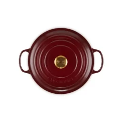 Cocotte en Fonte Ronde 28 cm Garnet Bouton Doré Le Creuset Signature